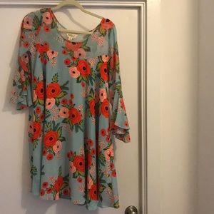 Flattering Anthropologie floral dress.